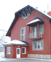 Дом, облицованный термопанелями с имитацией кипичной кладки